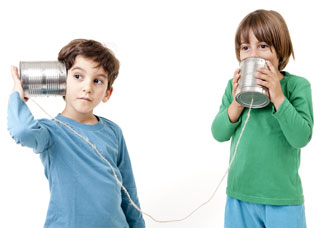 Two boys communicate through tin cans connected by string